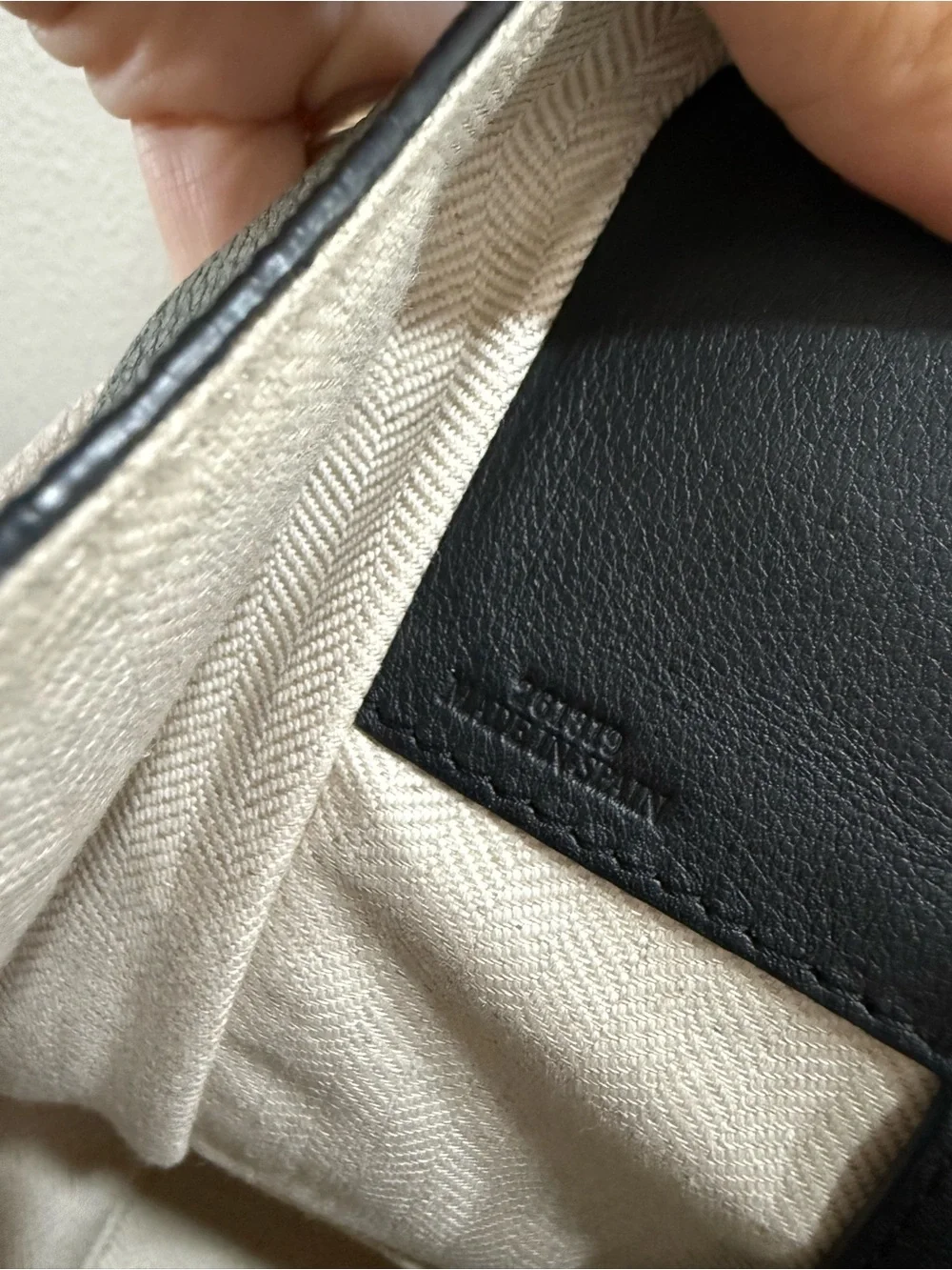 Green and cream Loewe hammock bag